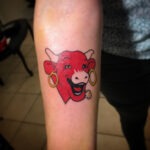 tattoo couleur vache qui rit