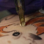 tattoo couleur oiseau orange
